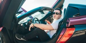 Celebrity Posing in a Sports Supercar