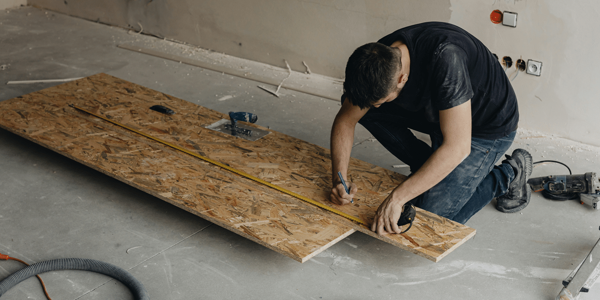 Image commercially licensed from: https://unsplash.com/photos/a-man-working-on-a-wooden-floor-in-a-room-jw7XYeGCA-M