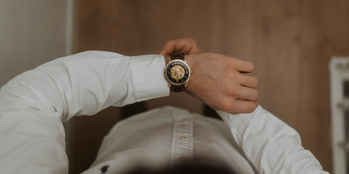 Image commercially licensed from: https://unsplash.com/photos/person-wearing-silver-and-black-analog-watch-SzPmNWX_4uo