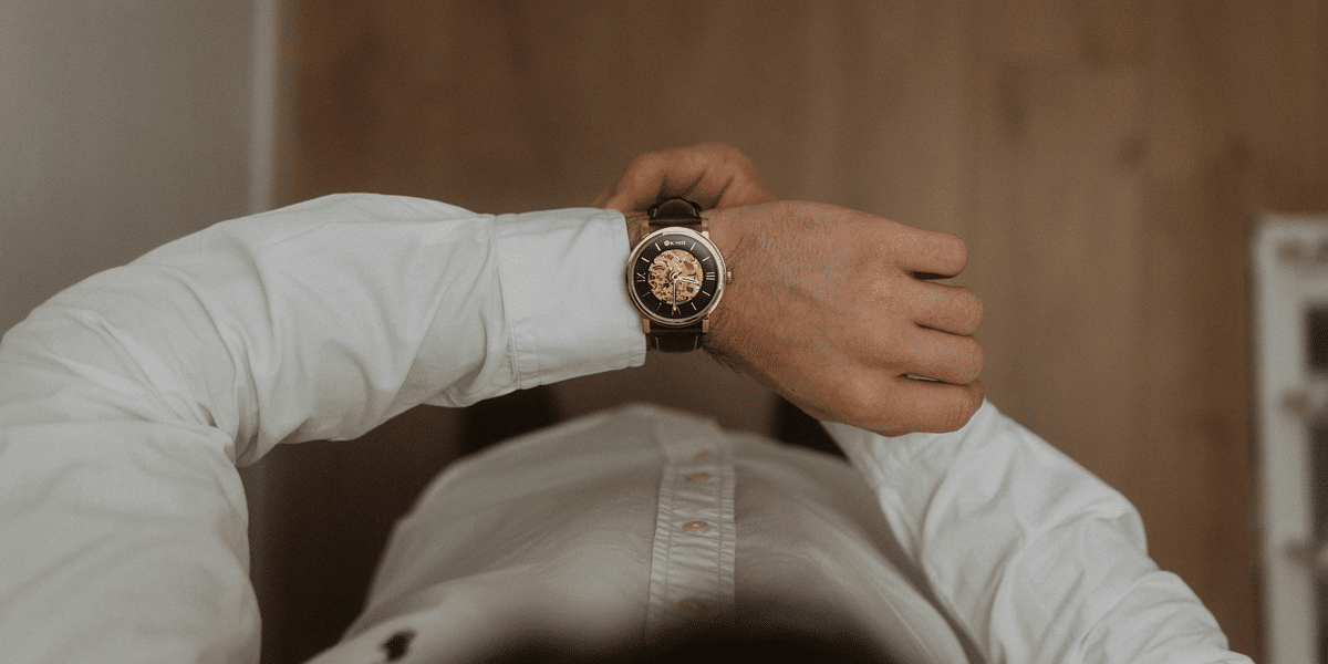 Image commercially licensed from: https://unsplash.com/photos/person-wearing-silver-and-black-analog-watch-SzPmNWX_4uo